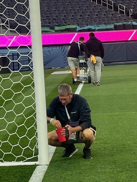 Perfecting soccer pitch lines